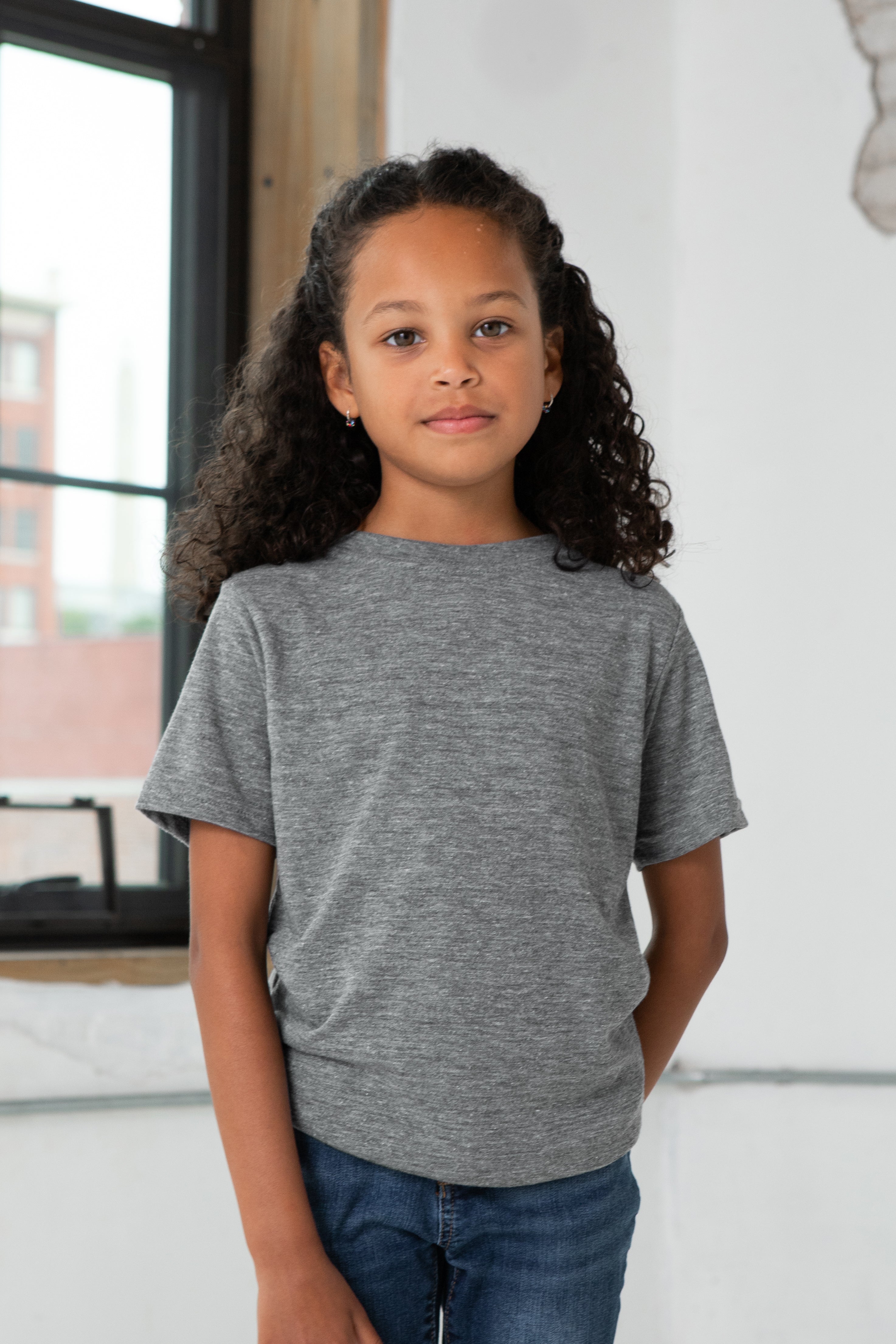Girl Model wearing GOEX Youth Eco Triblend Tee in Heather Grey