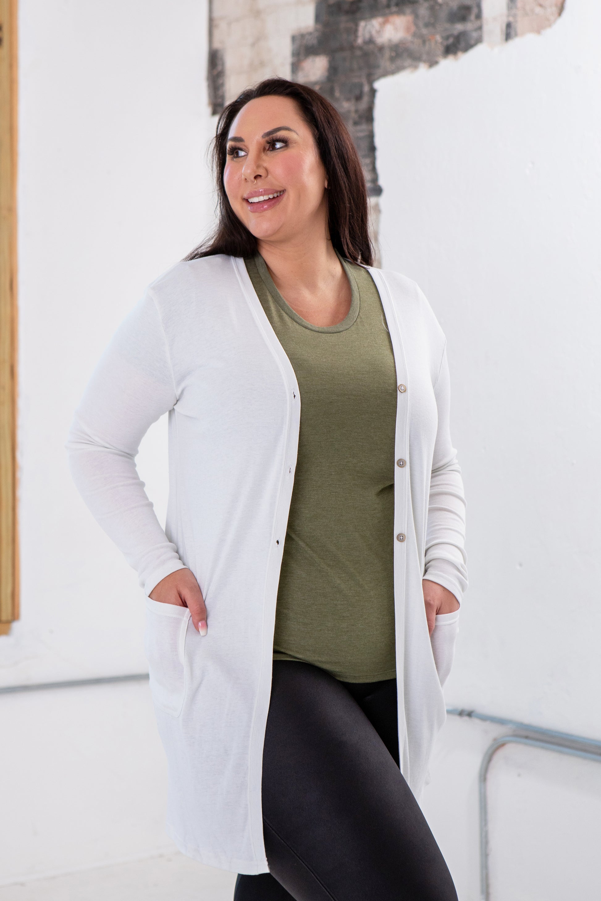 Female Model wearing GOEX Ladies Eco Triblend Rib Cardigan in White