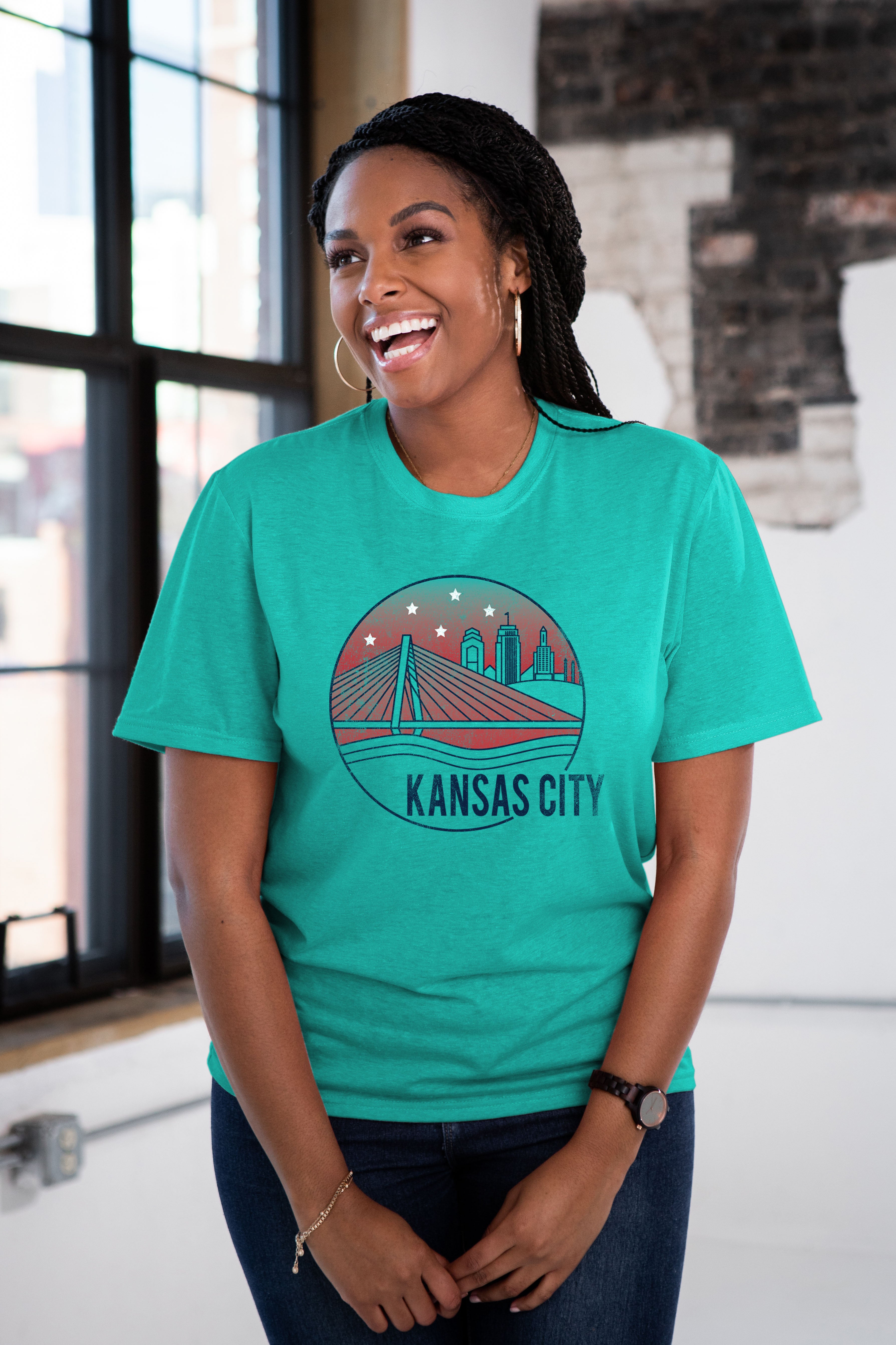 Female Model wearing GOEX Unisex and Men's KC Riverfront Eco Triblend Graphic Tee in Teal