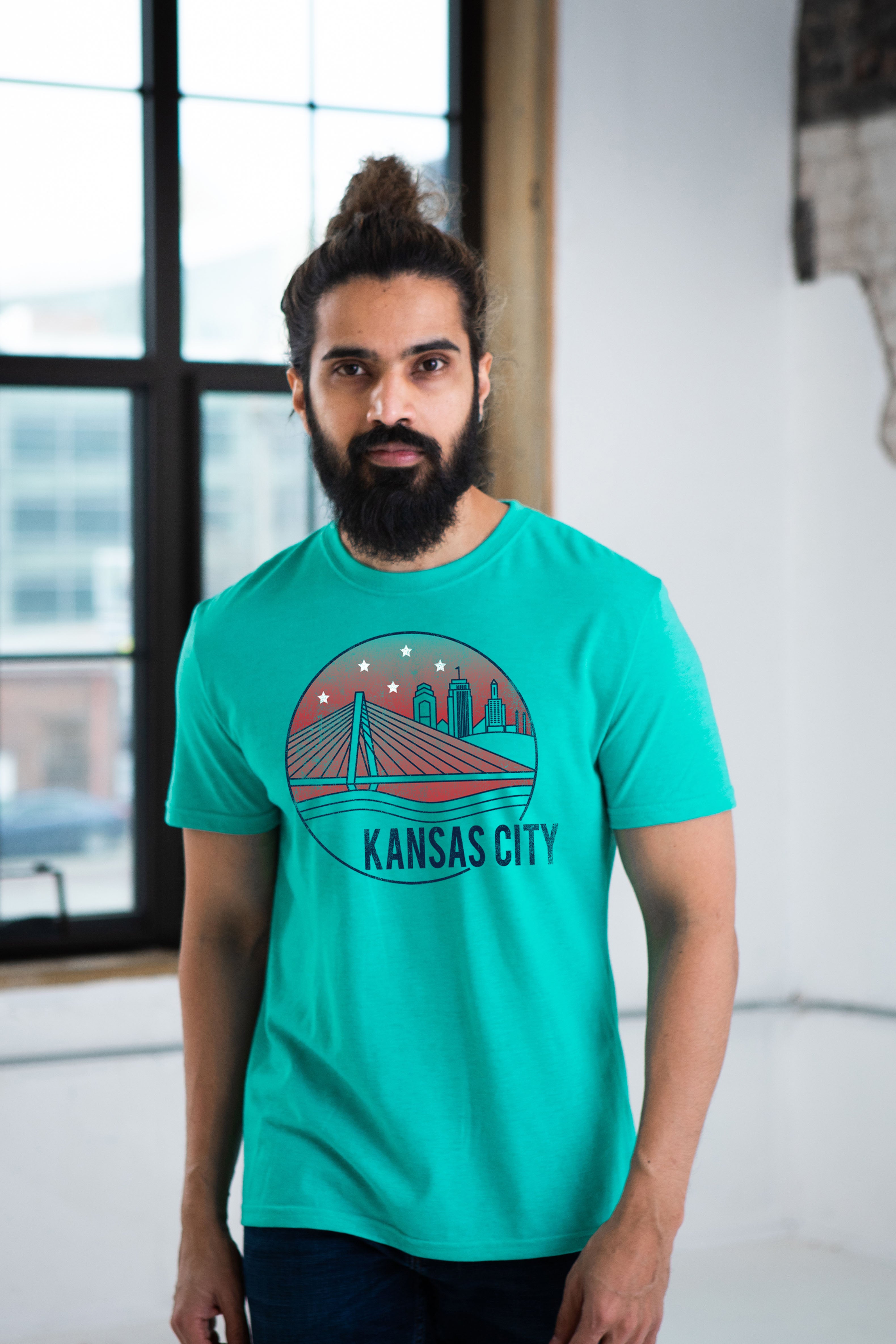 Male Model wearing GOEX Unisex and Men's KC Riverfront Eco Triblend Graphic Tee in Teal