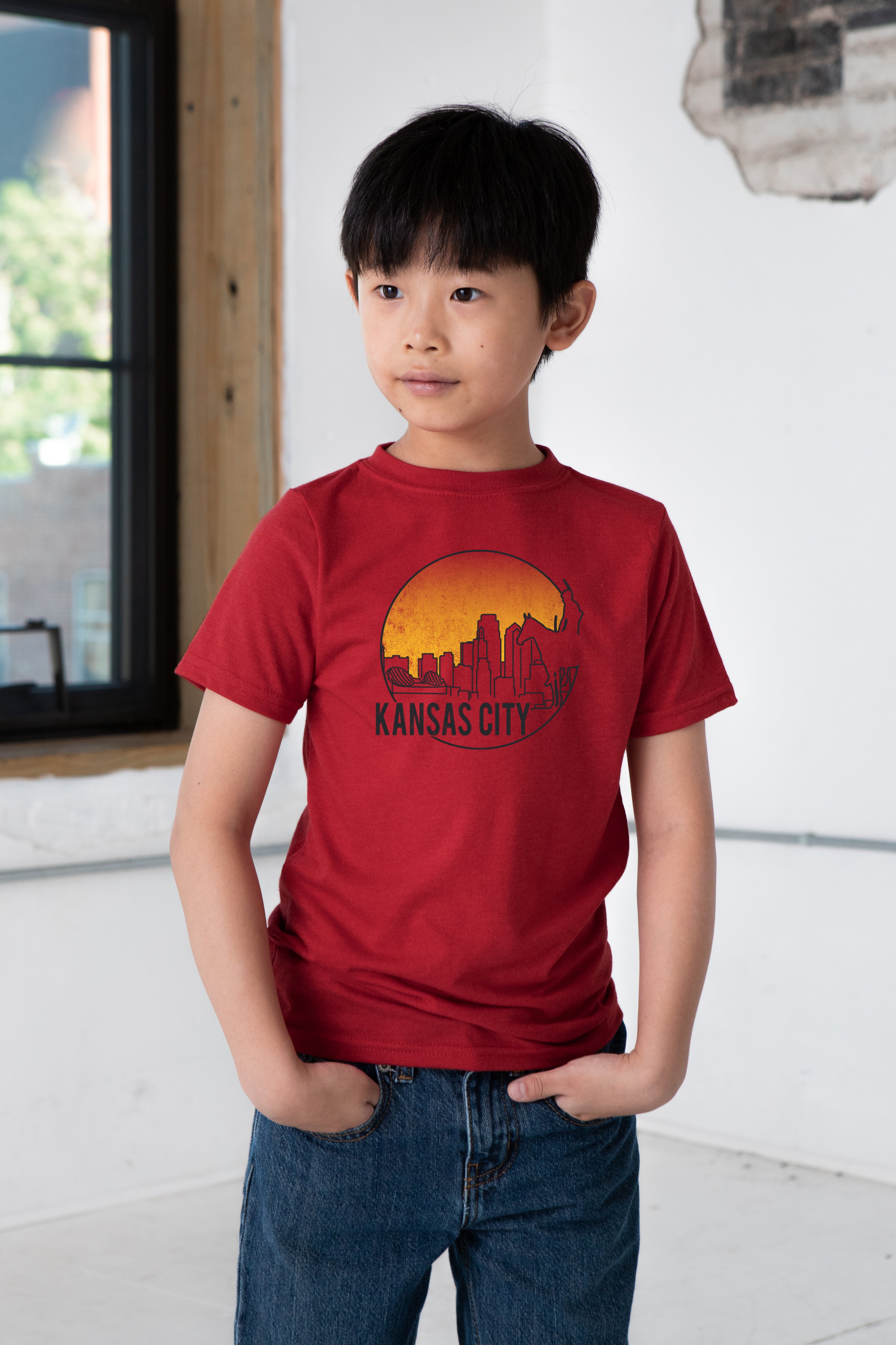 Boy Model wearing GOEX Youth KC Scout Eco Triblend Graphic Tee in Red