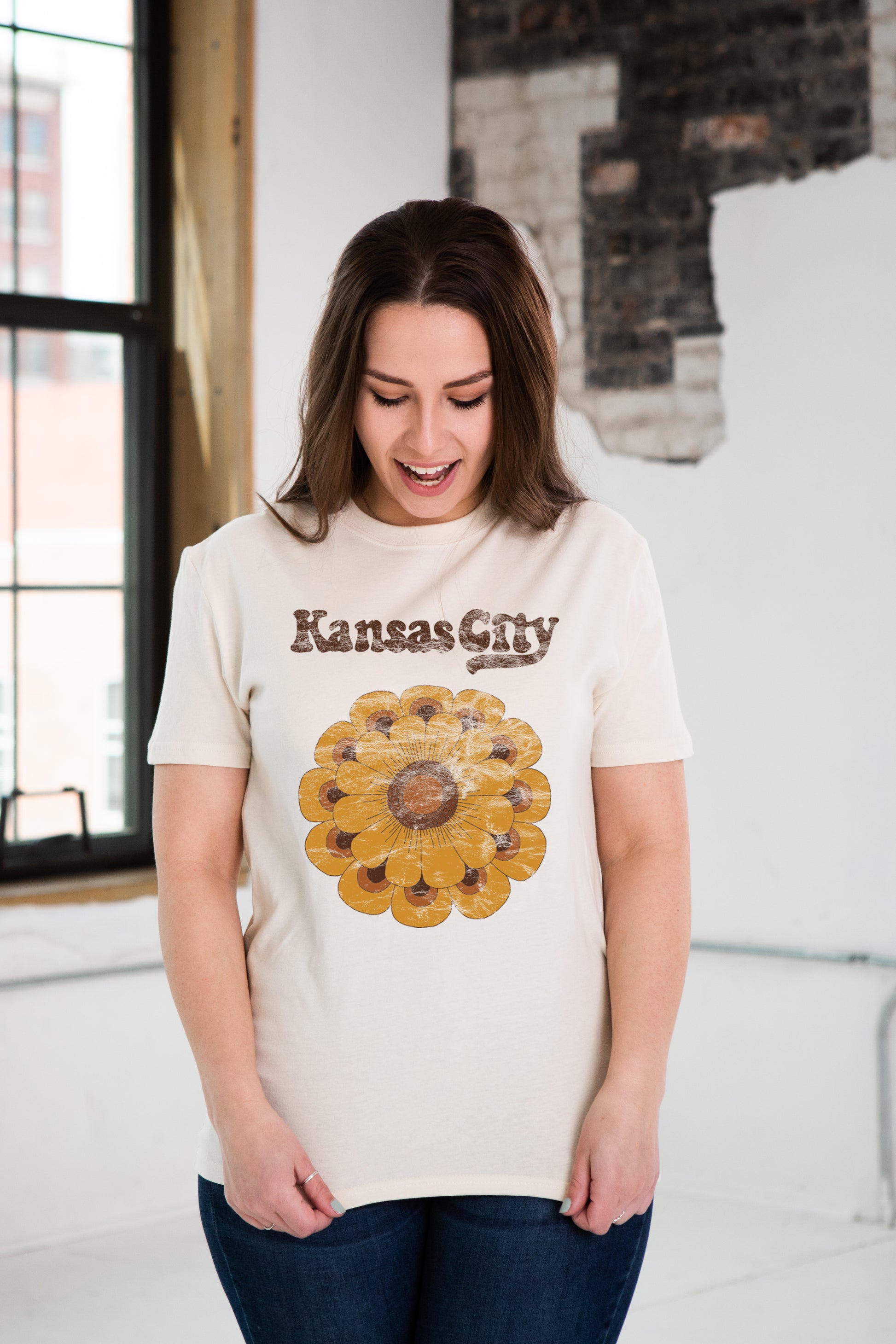 Female Model wearing GOEX Unisex and Men's Sunflower Graphic Tee in Ivory