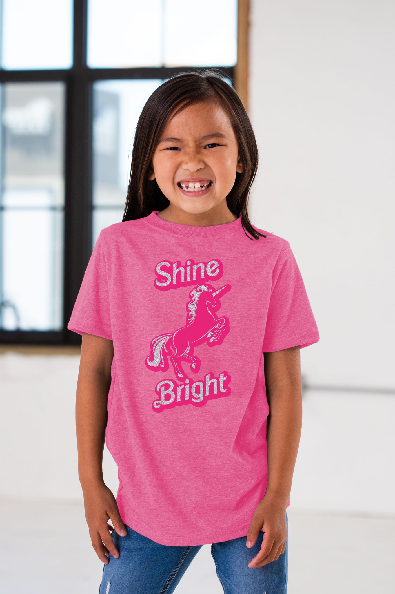 Girl Model wearing GOEX Youth Shine Bright Eco Triblend Graphic Tee in Neon Pink